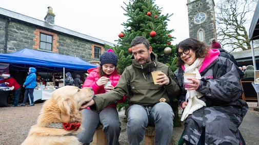 Family and dog enjoying the festive Yuletide